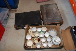 Two leather suitcases and a box of mixed china.