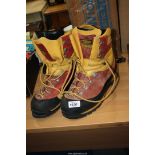 A pair of mens Scarpa work boots.