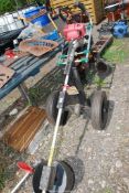A strimmer on wheels.