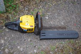 A McCulloch hedge trimmer, 16'' cutter bar, with blade cover, good compression at time of lotting.