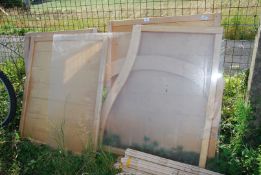 Wooden panels and a sheet of Perspex.