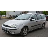 A Ford Focus Zetec 1,596 cc petrol-engined five-door Estate motor car in silver.