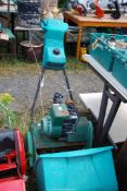 A cylinder mower with grass box.