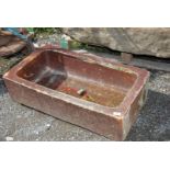 A brown glazed sink, 32 1/2'' wide x 18 1/2'' x 9'' high.