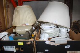 Two boxes of dinner plates, table lamps and shades.