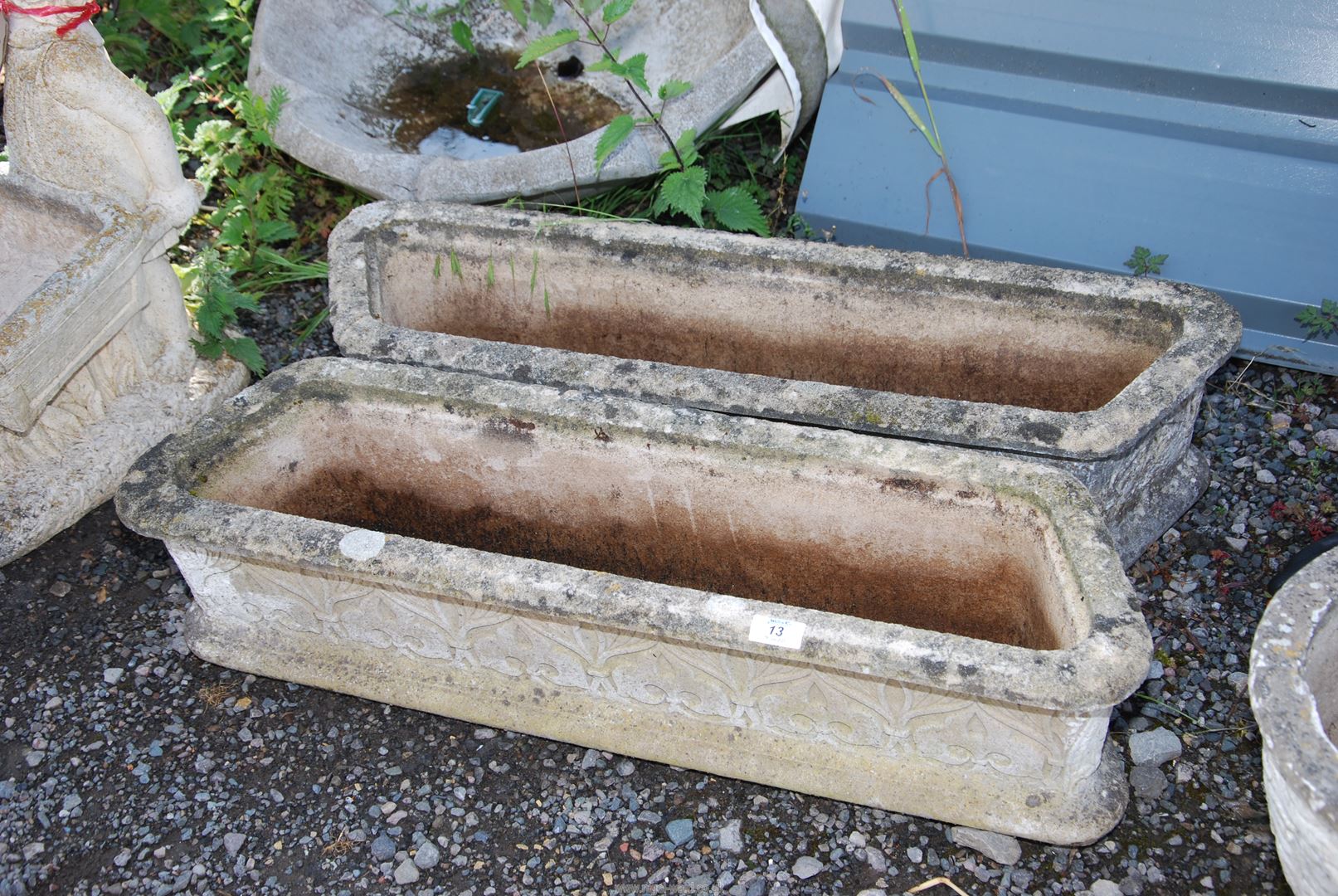 Two long concrete planters, 32'' long x 9'' wide x 8'' high.