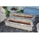 Two long concrete planters, 32'' long x 9'' wide x 8'' high.