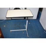 An over bed adjustable table.