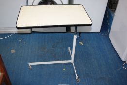 An over bed adjustable table.