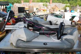 A 7' semi ridged inflatable dingy with Vianare outboard trolling motor, oars,