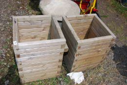 Two wooden planters, 16'' square x 21'' high.