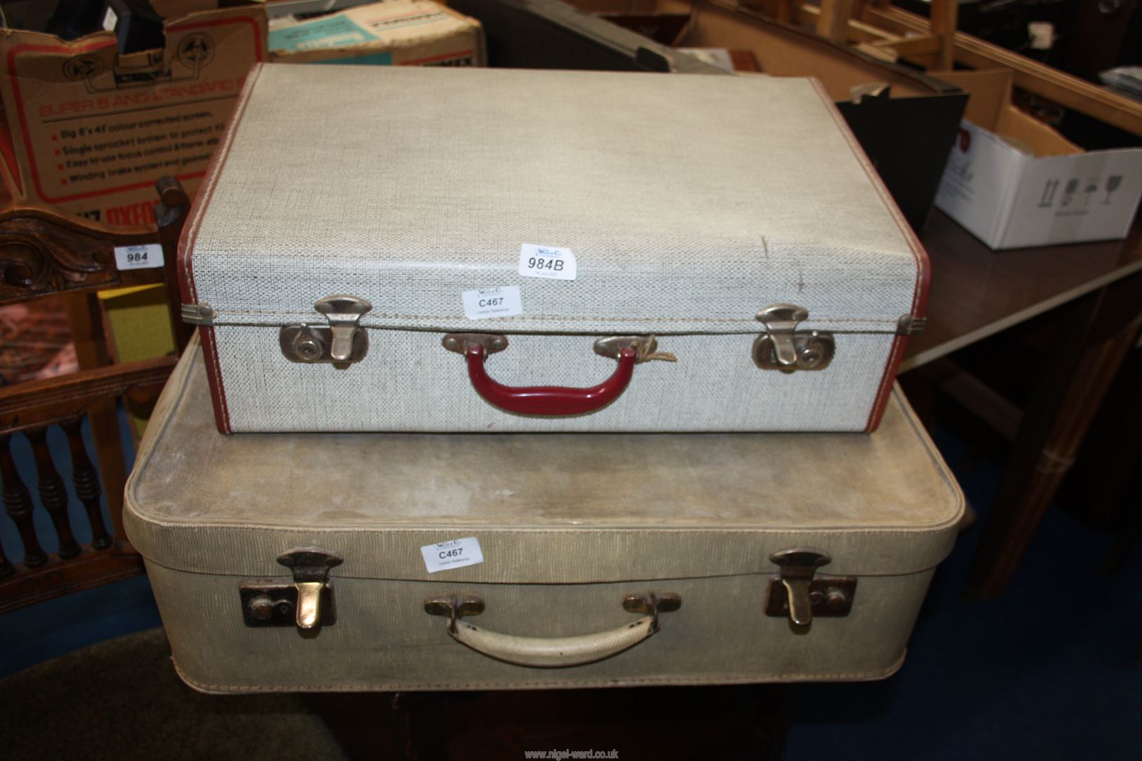 Two vintage suitcases.