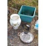 A shoe last, bake stone, planter and vase.