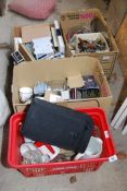 Four boxes of mixed china, table mats, cutlery, Salter scales, clocks, cased stereo recorder etc.