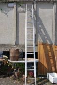 An 11 rung Aluminium double ladder.