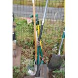 A quantity of garden tools, rake, shears, stainless steel hoe, etc.