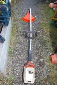 A Stihl SF40 strimmer, good compression at time of lotting.