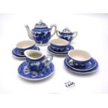 A Doll's china teaset in Willow pattern.