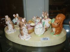A quantity of Royal Albert Beatrix Potter figures including 'No More Twist',