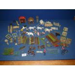 A quantity of Britains lead garden pieces including summer house, flower beds, fencing etc.