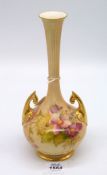 A Royal Worcester Blush Ivory twin handled vase, back stamp 1761, hand painted flowers,