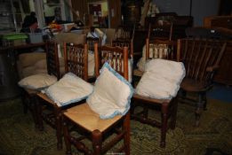 An appealing set of seven bobbin turned backed Dining Chairs in mixed woods and including five