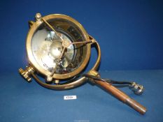 A large brass cased Francis Searchlight, 9 1/4'' diameter, total length 21''.