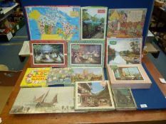 A quantity of vintage wooden jigsaws including Victory, Ponda, etc.