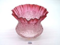 An ombre Cranberry etched oil lamp with frilled edged etched leaf pattern 7 1/2" diameter overall