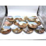 A quantity of Bradex wall Plates including A Winter scene with horses dragging trees,