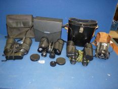 Three pairs of binoculars including Russian made 7 x 50,
