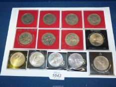 A quantity of cased commemorative Crowns including Queen Mothers 80th Birthday coin, Silver wedding,