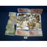 A quantity of foreign coins and notes including Bangladesh, Tanzania, Greece, Spain, France, etc.