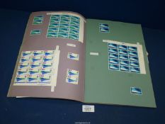 A Scrap book of mint sheets of stamps and First day covers 1968-1970.