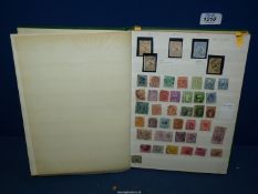 A stock book of Australian stamps including Queen Victoria and South Africa.