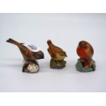 Three Royal Worcester bird ornaments including Robin, Wren and Hedge Sparrow, all a/f.