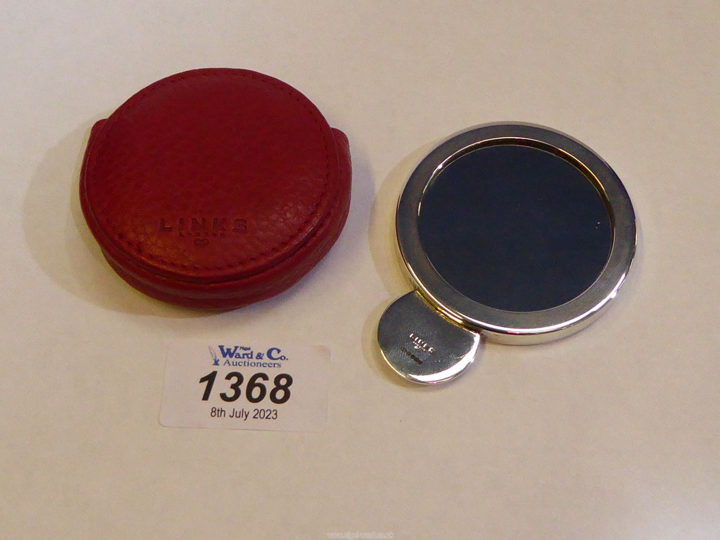 A Links of London silver mirror with hallmarks for Edinburgh 2004 in a red leather branded case.