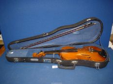 A cased Skylark Violin with bow. 31'' long, some damage.