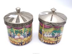 Two German made Biscuit Barrels with scenes from The Swan Lake ballet and with pewter lids.