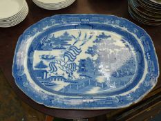 A large Willow pattern meat plate, (some wear to rim), 21" x 15 1/2".