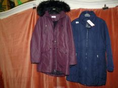 Two Marks & Spencer's ladies waterproof coats including a 'Collection' navy blue padded and 'Per