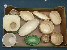 A quantity of Sylvac china including Pineapple, pebble and shell shape vases,