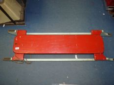 A vintage Sledge in red and blue paintwork