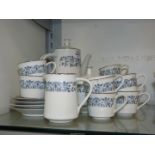 A Noritake, Royal Blue pattern coffee set including coffee pot, eight coffee cups and nine saucers,