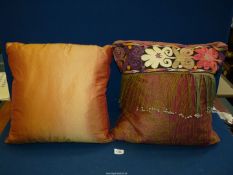 A woven silk cushion,