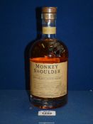 A 70 cl bottle of Monkey Shoulder blended malt Scotch Whisky.