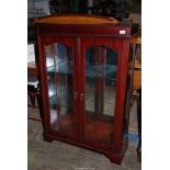A contemporary darkwood china Display Cabinet,
