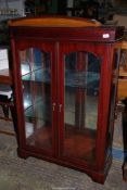 A contemporary darkwood china Display Cabinet,