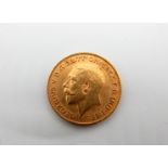 A 1912 George V, Gold half sovereign, 3.98gm.