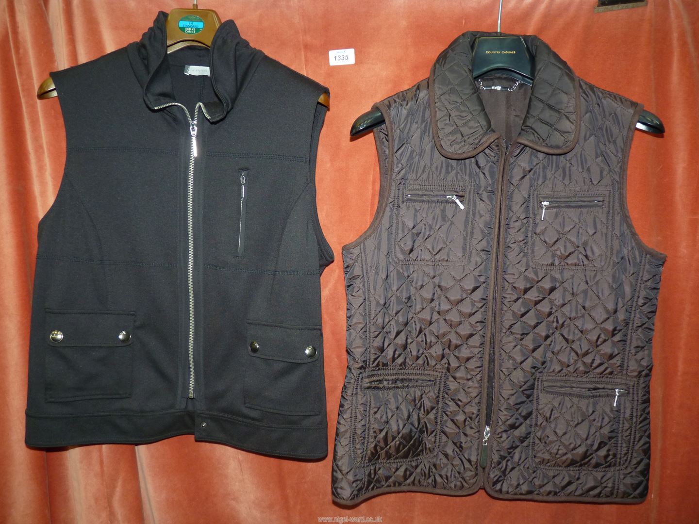 A 'Different' black gilet, UK size 40 and a 'Hobbs' black quilted gilet, size 10.